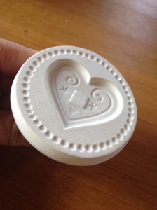 Slovenian cookie press with heart symbol.